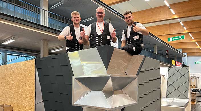 Bild von Team Metall mit Trainer bei der Dachdecker-WM